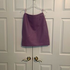 Wilson’s Leather Purple Mini Skirt with side zippers. Brand new .size 6.